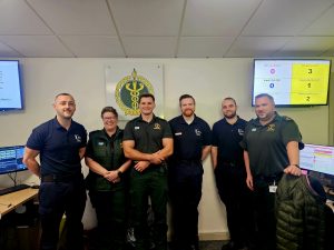 Photographed in Emergency Ambulance Control is Chris Tedford EMD, Joanna Craig EMD, Cole Barbour EMD, Paul McKenna BSc Paramedic Student, Henry Barker BSc Paramedic Student, and Conall Jemfrey BSc Paramedic Student.