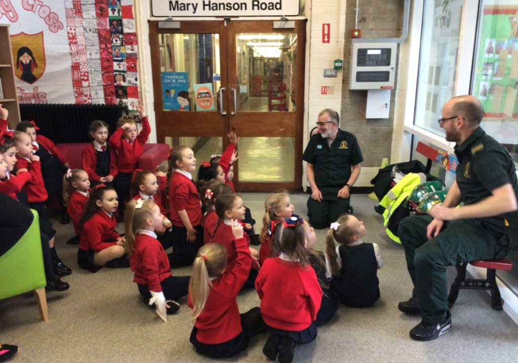 Class of pupils speaking to NIAS staff