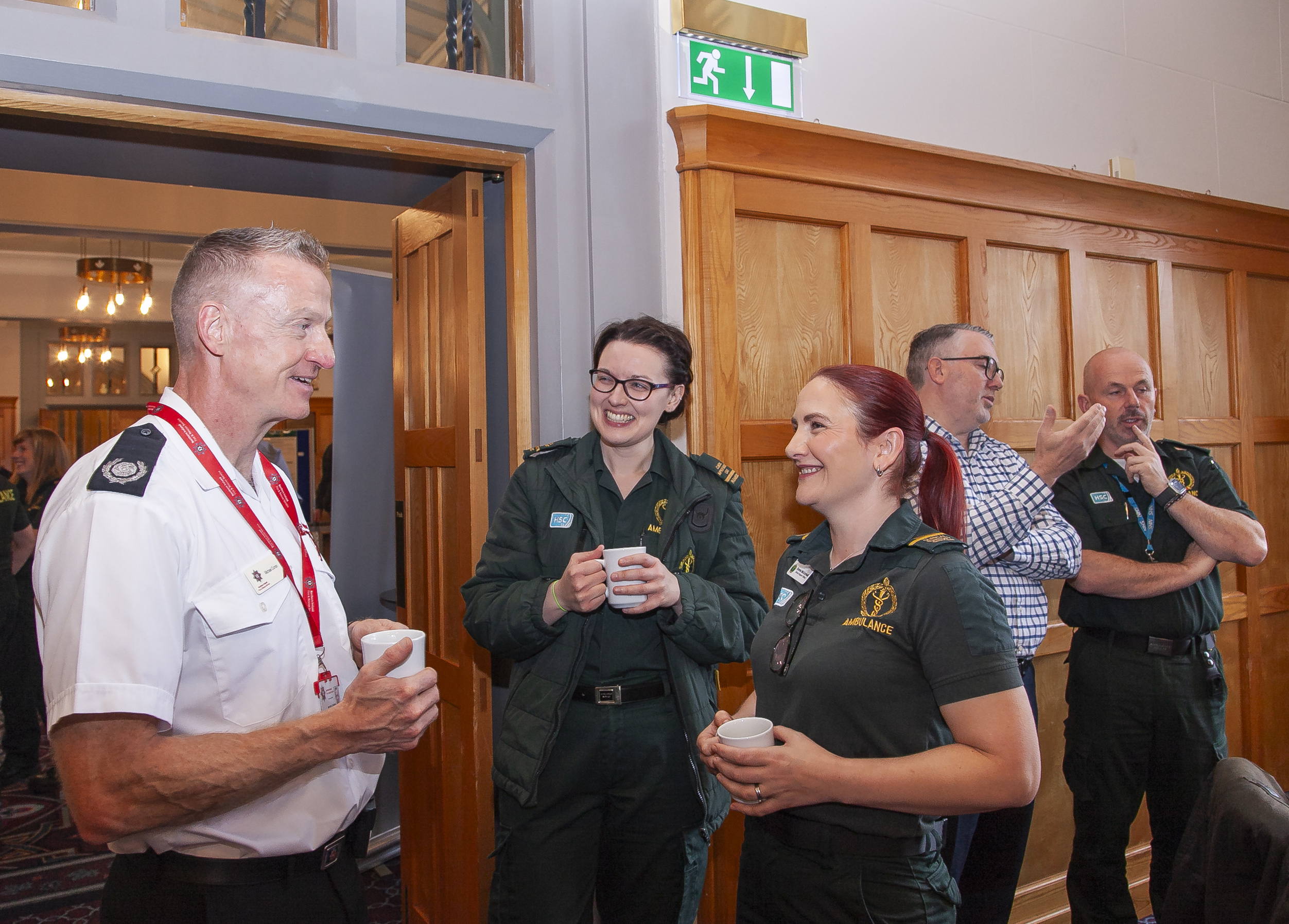 Staff talking at Cardiac Arrest research event