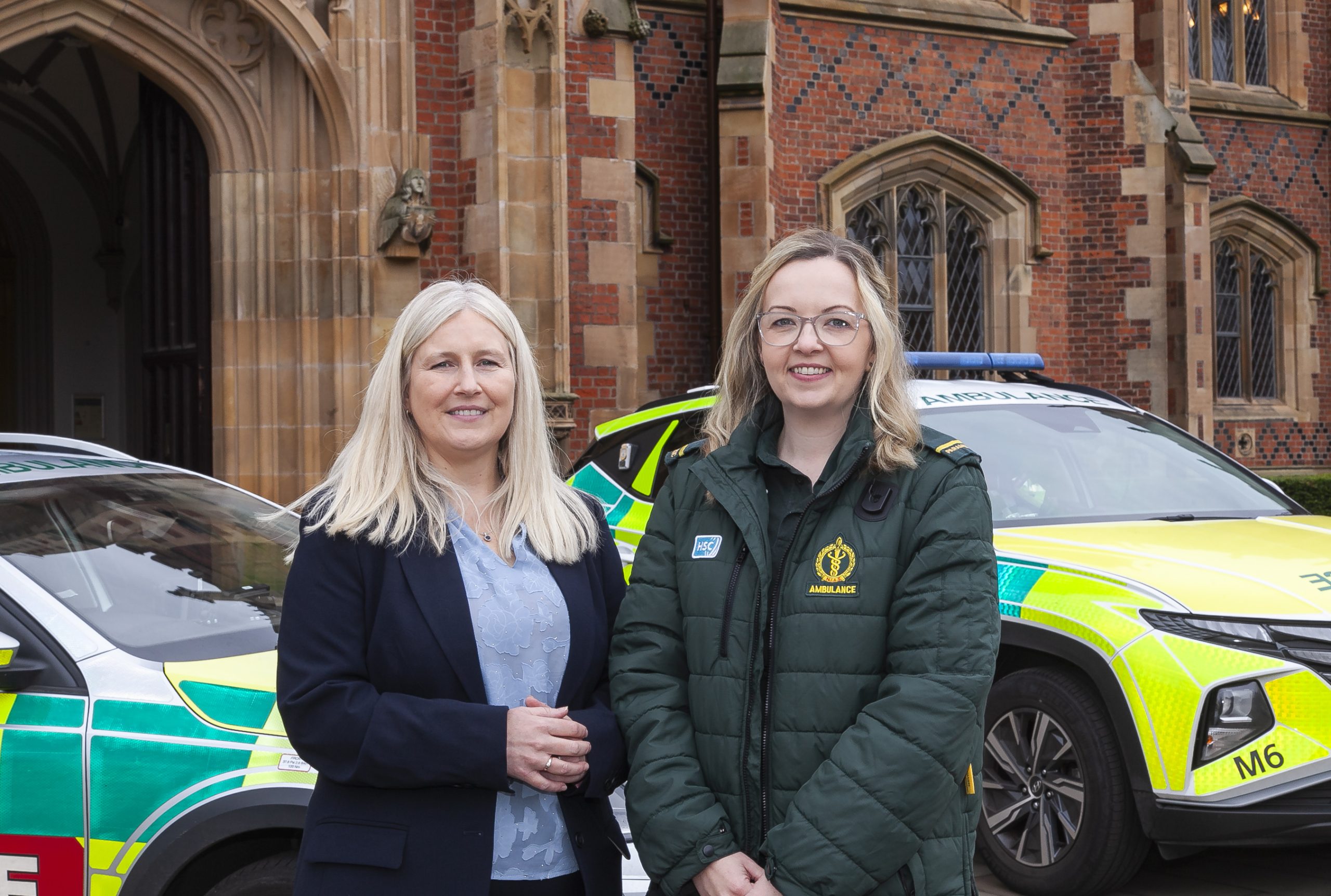 Photo of staff outside Queens University Belfast Building